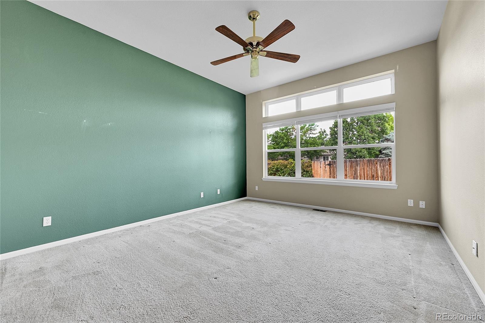 19115 East Belleview Place Centennial, CO 80015 - Photo 21 of 47 an empty room with a window