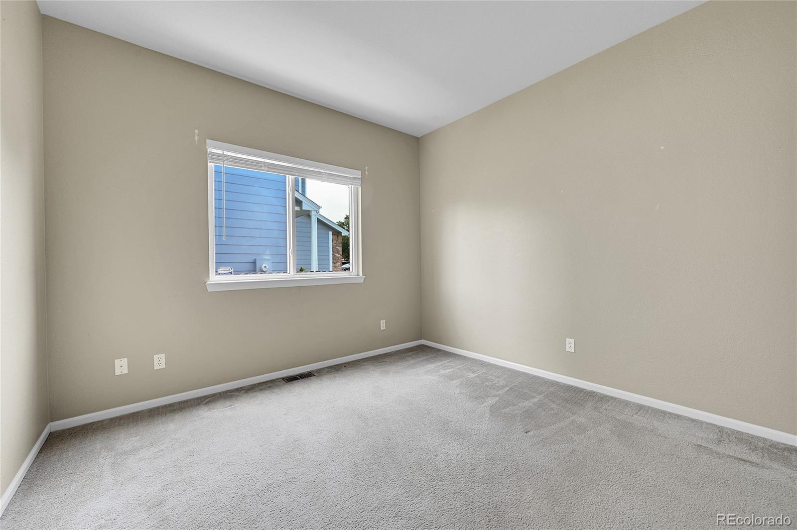 19115 East Belleview Place Centennial, CO 80015 - Photo 25 of 47 an empty room with a window