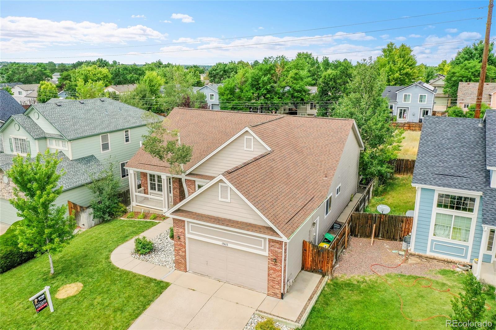 19115 East Belleview Place Centennial, CO 80015 - Photo 43 of 47 an aerial view of a house with a yard table and chairs