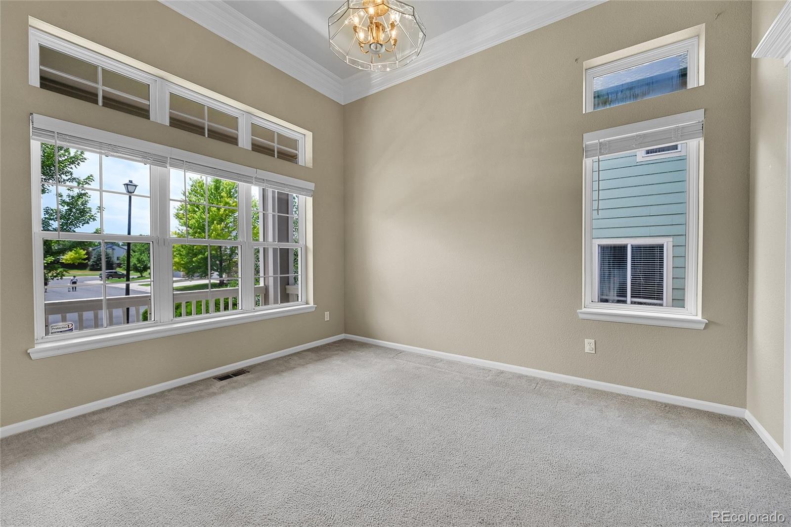 19115 East Belleview Place Centennial, CO 80015 - Photo 8 of 47 a view of an empty room with a window