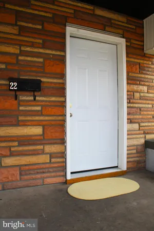 an entryway with wooden floor