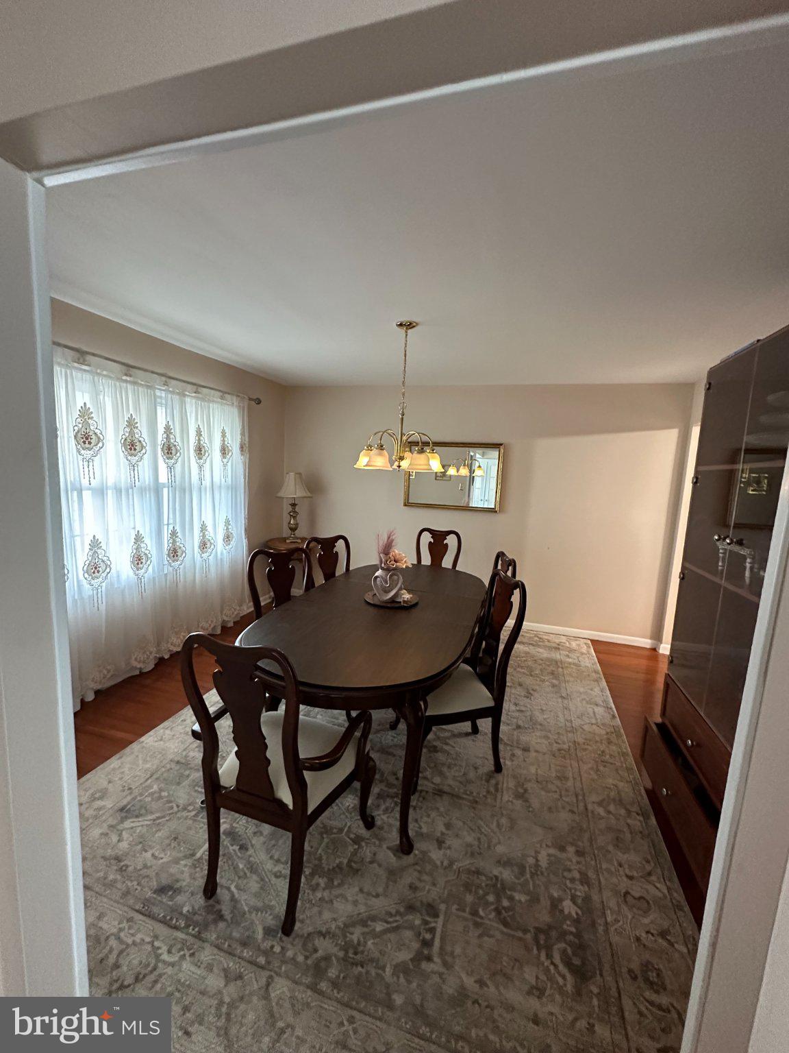 321 Surrey Road Cherry Hill, NJ 08002 - Photo 18 of 24 a view of a dining room with furniture and window