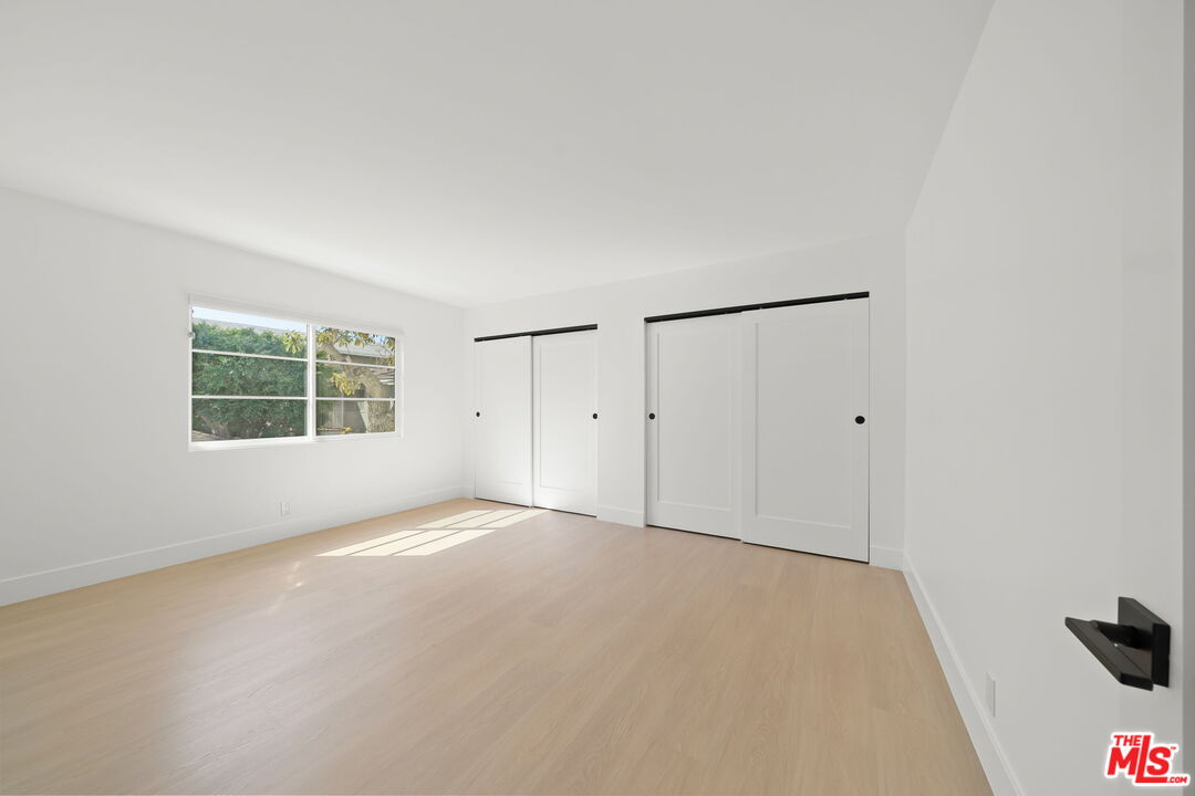 1201 Ohio Avenue, Unit 4 Long Beach, CA 90804 - Photo 12 of 18 an empty room with windows