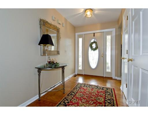 2035 Forest Ridge Road St. Charles, IL 60174 - Photo 2 of 16 a view of a livingroom with furniture wooden floor and window