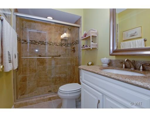 2035 Forest Ridge Road St. Charles, IL 60174 - Photo 11 of 16 a bathroom with a granite countertop sink toilet a mirror and shower