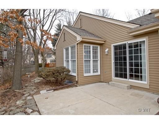 2035 Forest Ridge Road St. Charles, IL 60174 - Photo 15 of 16 a front view of a house with a garden