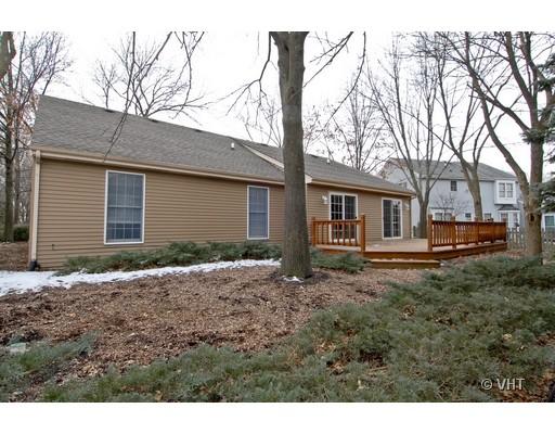 2035 Forest Ridge Road St. Charles, IL 60174 - Photo 16 of 16 a backyard of a house with yard and outdoor seating
