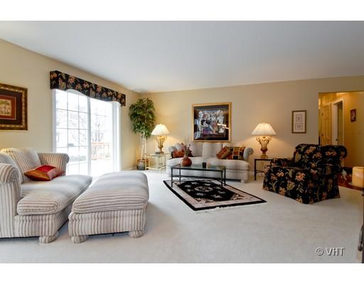 2035 Forest Ridge Road St. Charles, IL 60174 - Photo 3 of 16 a bedroom with furniture a rug and a couch