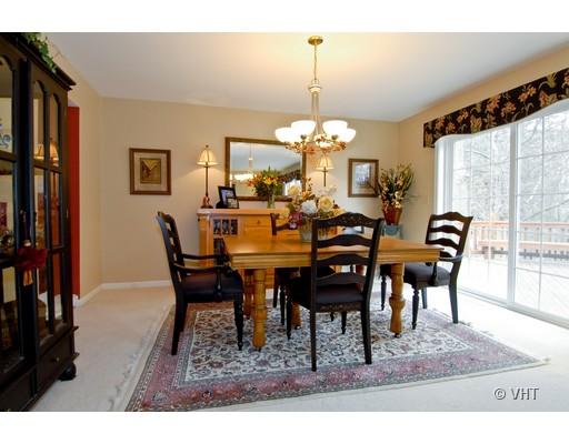2035 Forest Ridge Road St. Charles, IL 60174 - Photo 7 of 16 a view of a dining room with furniture and chandelier