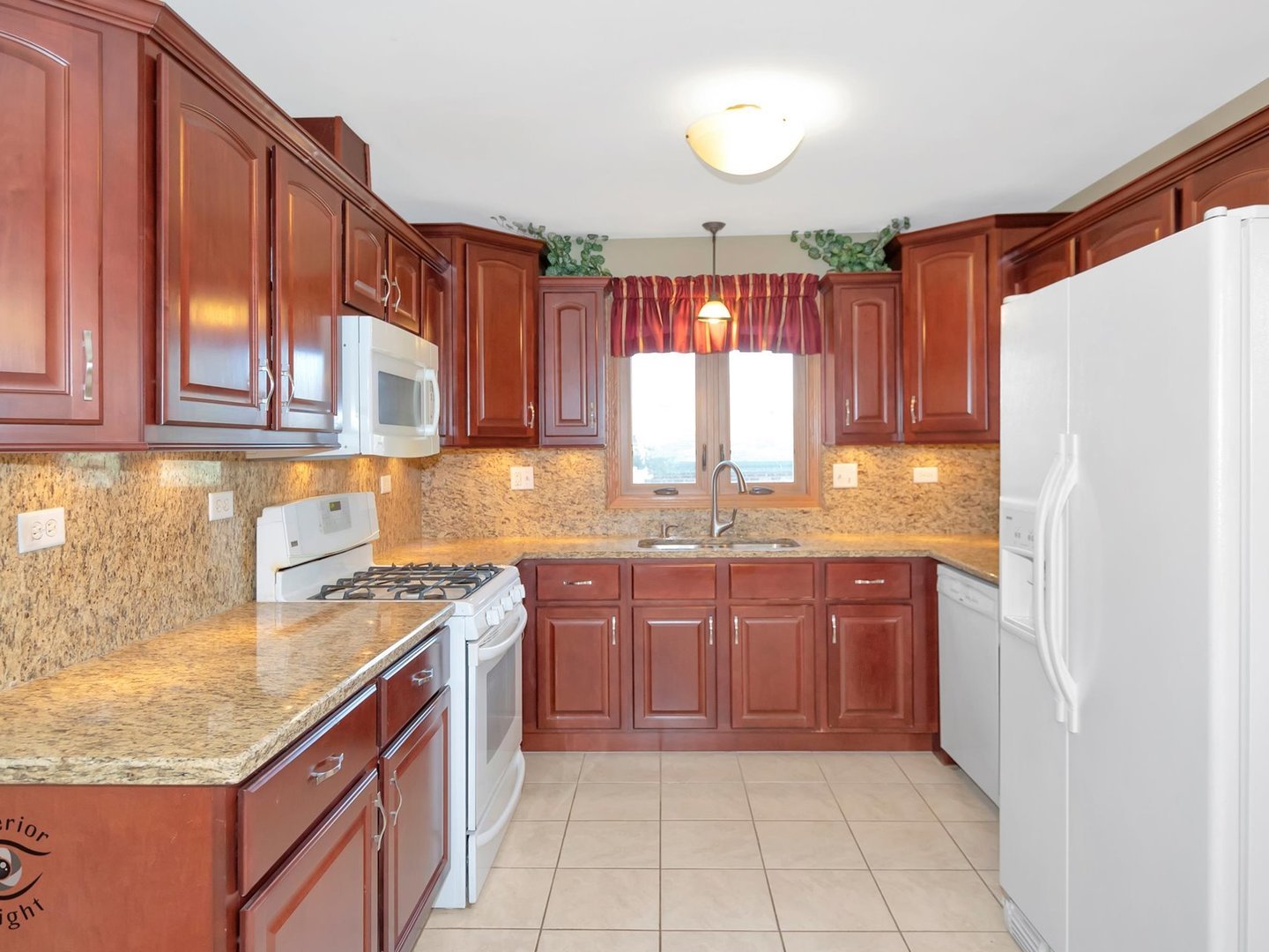 14501 South Abbott Road East Homer Glen, IL 60491 - Photo 11 of 31 a kitchen with a sink a stove a refrigerator and cabinets