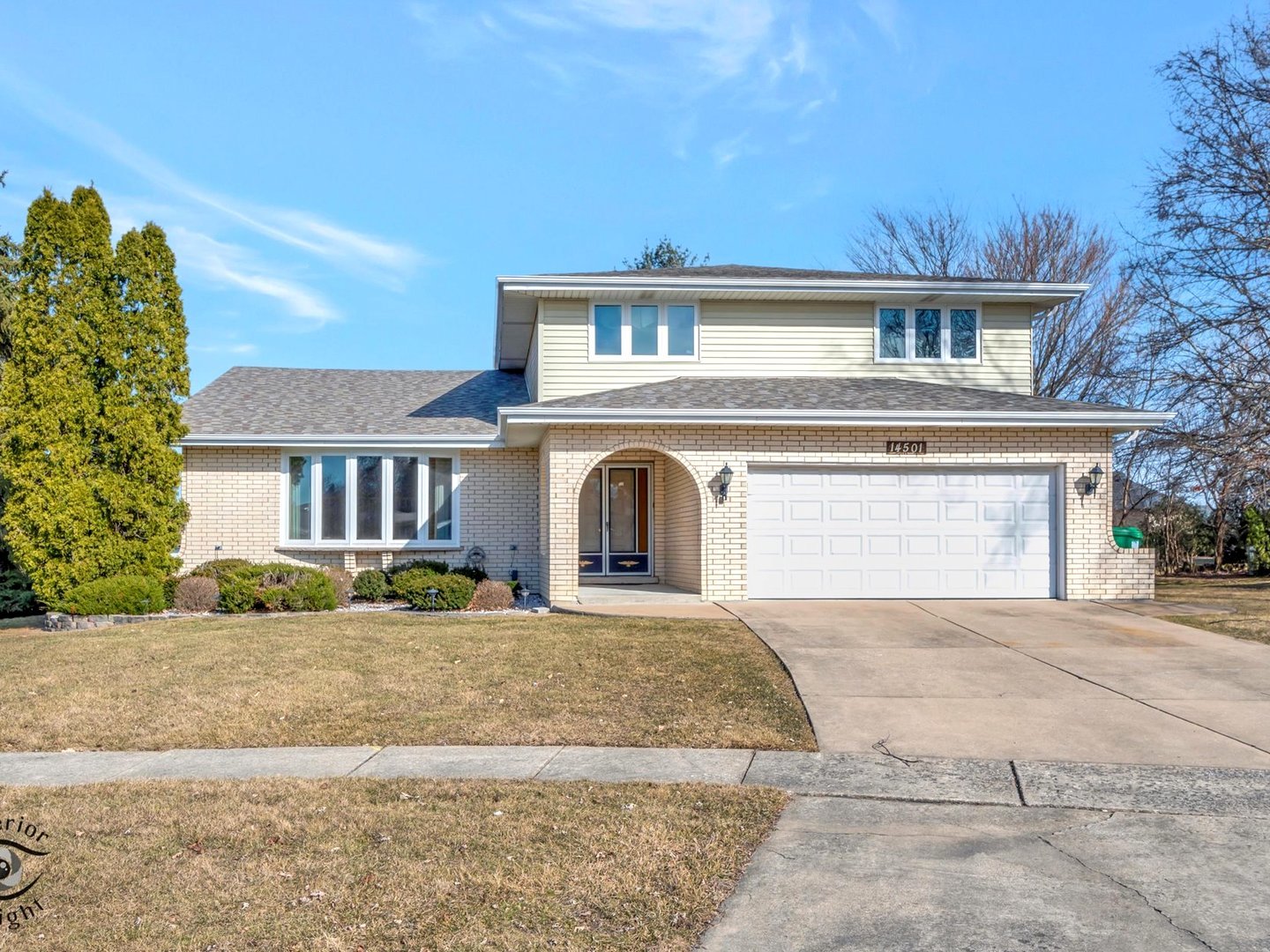 14501 South Abbott Road East Homer Glen, IL 60491 - Photo 2 of 31 a front view of a house with a yard and garage