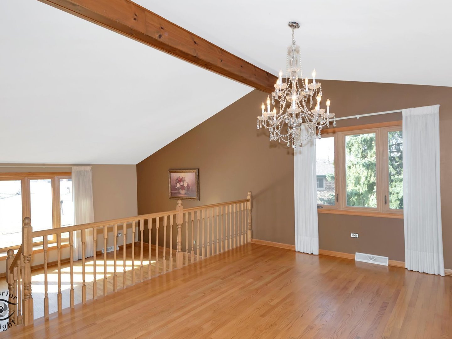 14501 South Abbott Road East Homer Glen, IL 60491 - Photo 6 of 31 a view of wooden floor and a chandelier in a room