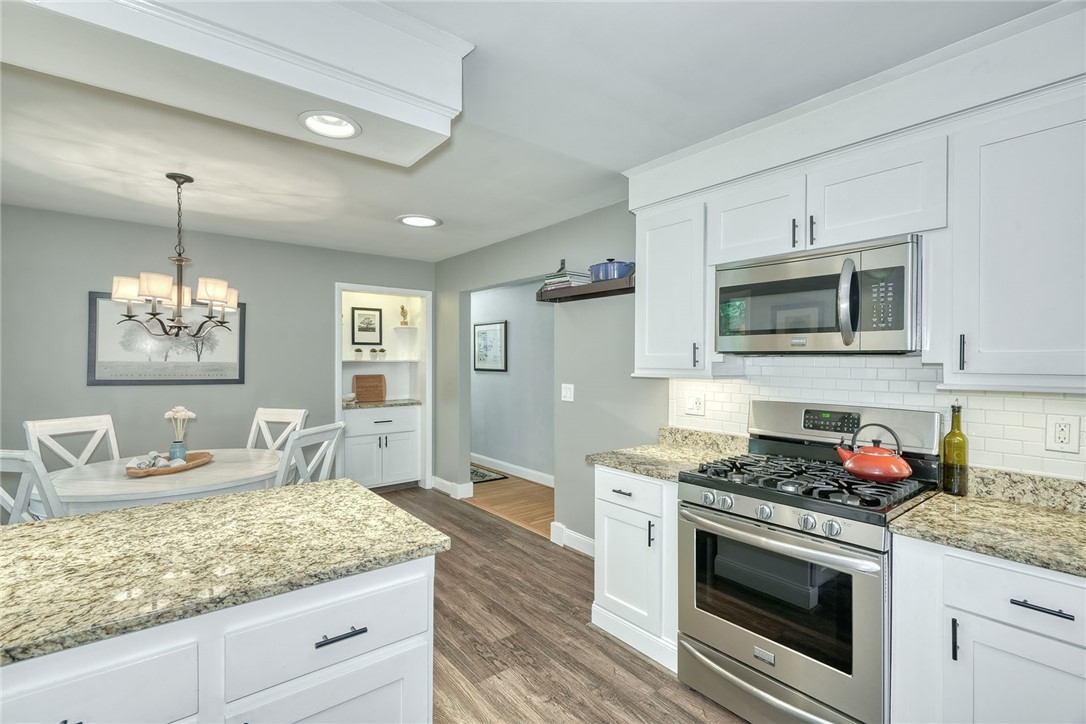 175 Longview Drive Webster, NY 14580 - Photo 18 of 47 beautiful updated kitchen is open to the dining sp