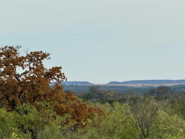 a view of a house with a mountain