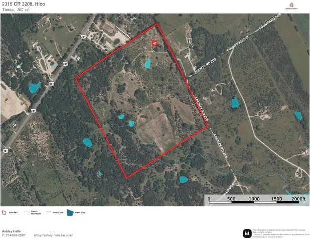 a view of a house with a tree in the background