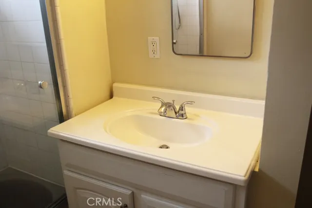 a view of empty room with floor to ceiling window