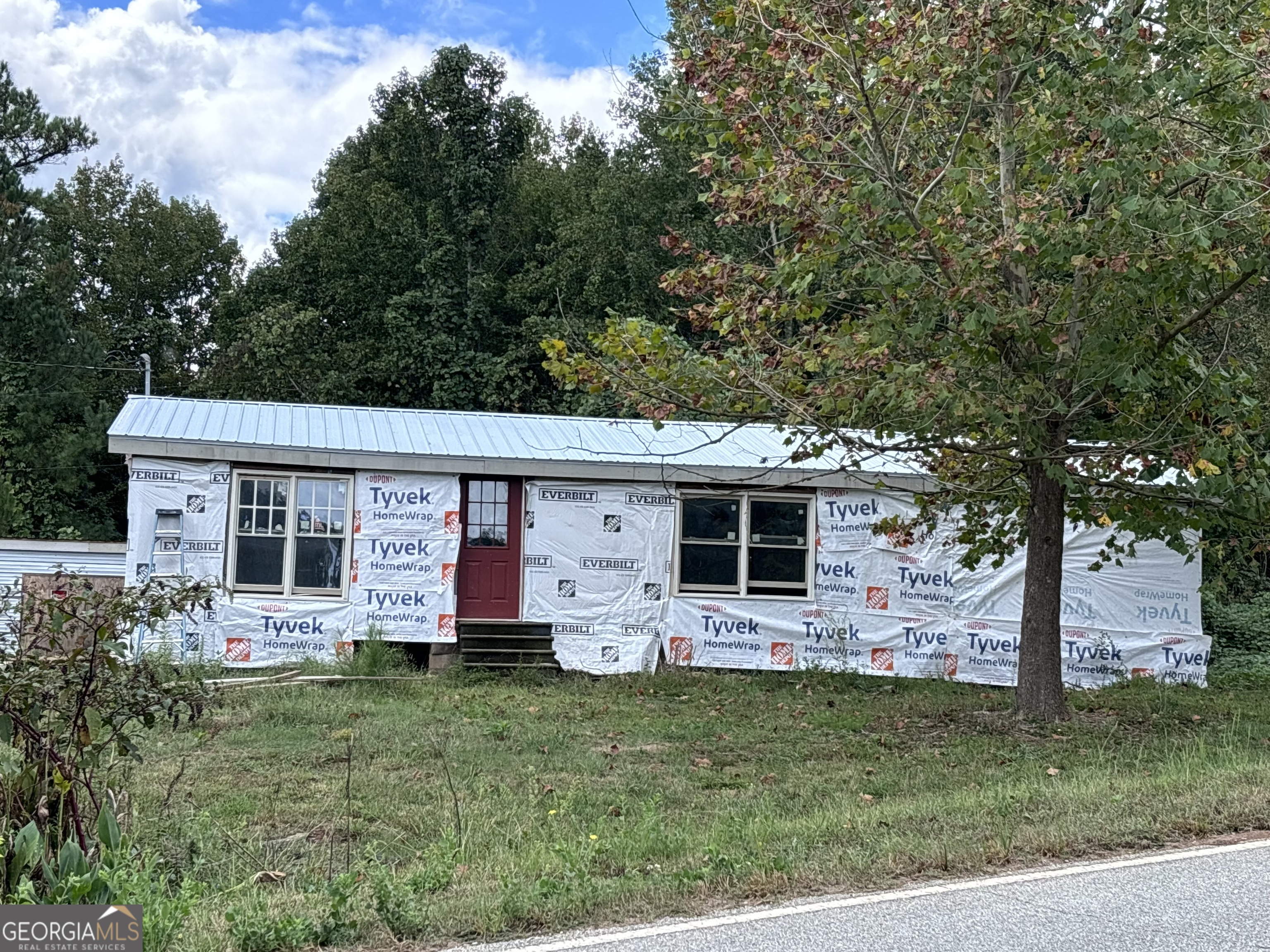 803 Ridgeland Road Eastanollee, GA 30538 - Photo 1 of 1 front view of a house with a yard