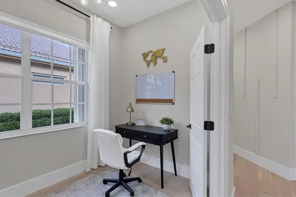 a bathroom with a double vanity sink mirror and shower