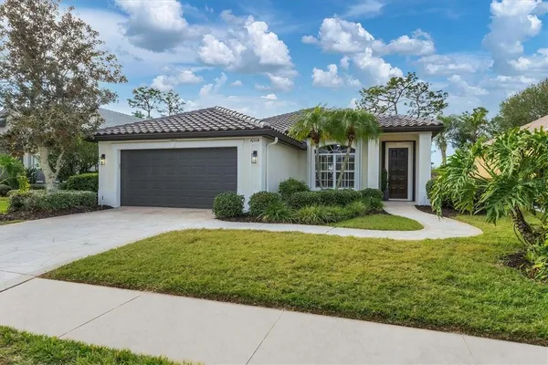 a front view of a house having yard