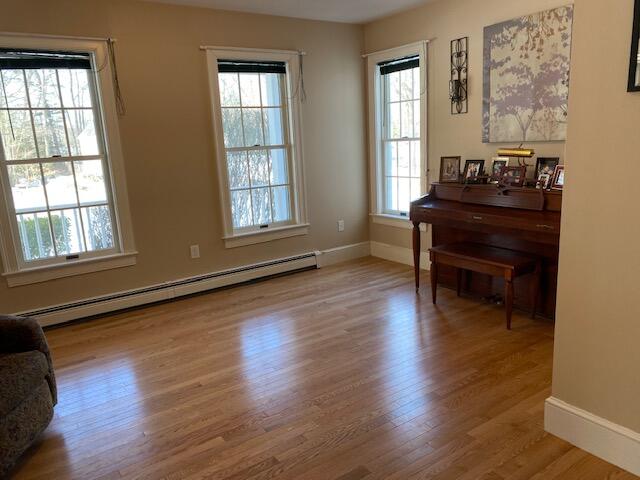 22 Valley Road Cape Elizabeth, ME 04107 - Photo 17 of 36 living room and piano