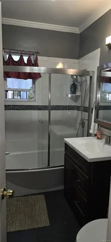 a bathroom with a sink and a vanity