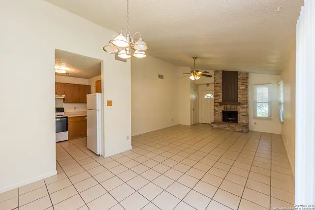 a view of a kitchen with a sink cabinets and window
