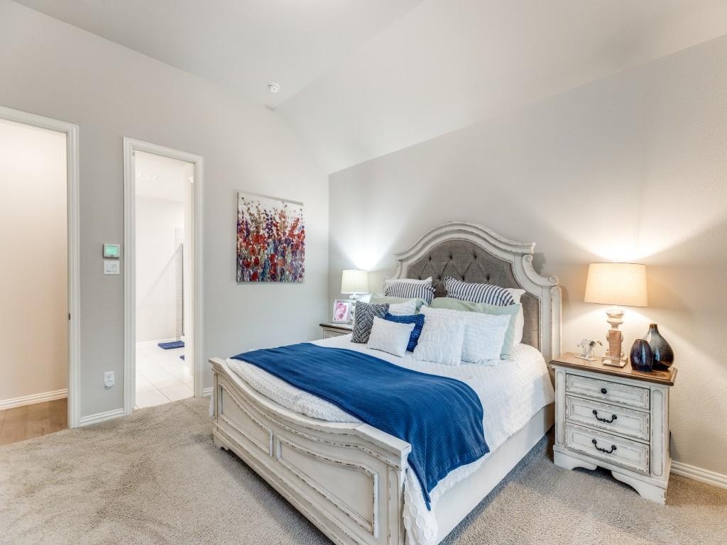1608 Carnation Street Prosper, TX 75078 - Photo 16 of 25 a bedroom with a bed and lamp