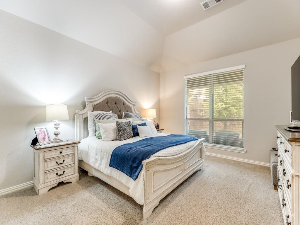 1608 Carnation Street Prosper, TX 75078 - Photo 17 of 25 a bedroom with a bed and a window
