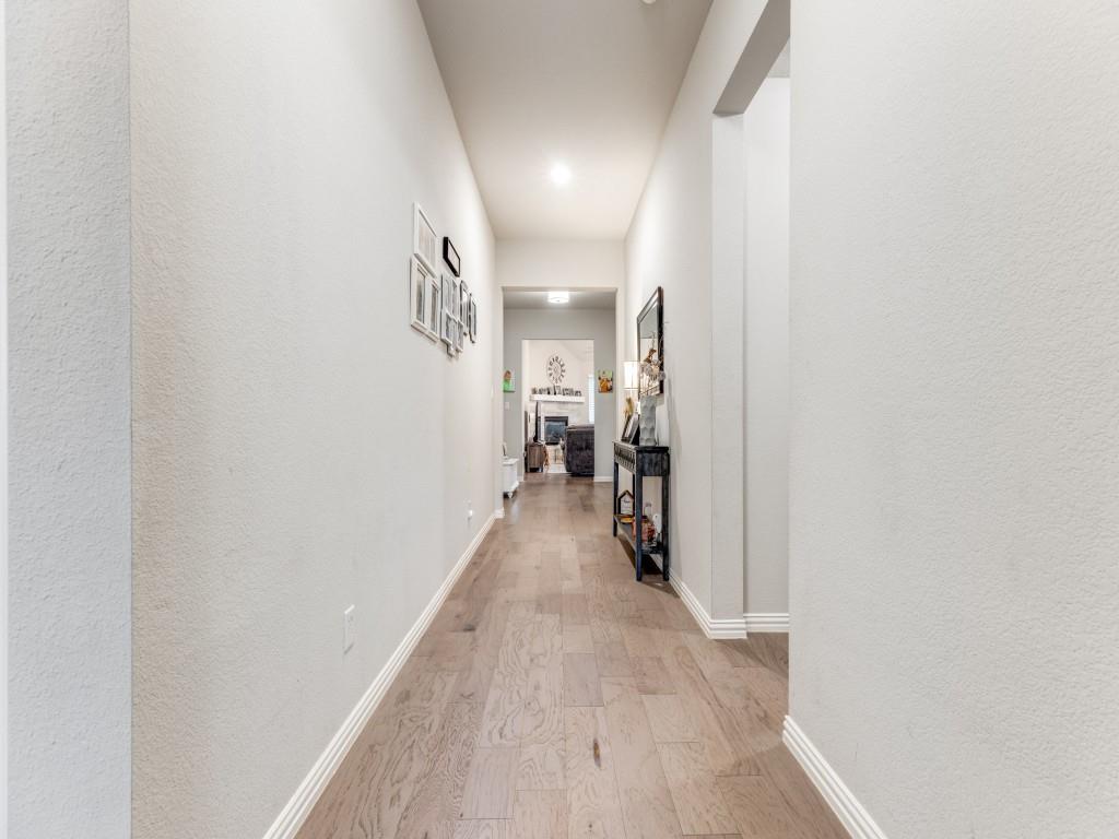 1608 Carnation Street Prosper, TX 75078 - Photo 4 of 25 a view of hallway with livingroom
