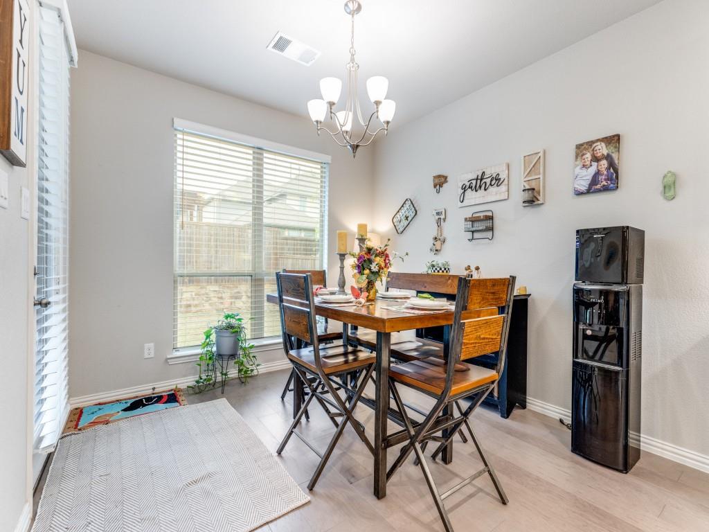 1608 Carnation Street Prosper, TX 75078 - Photo 9 of 25 a dining room with furniture and window