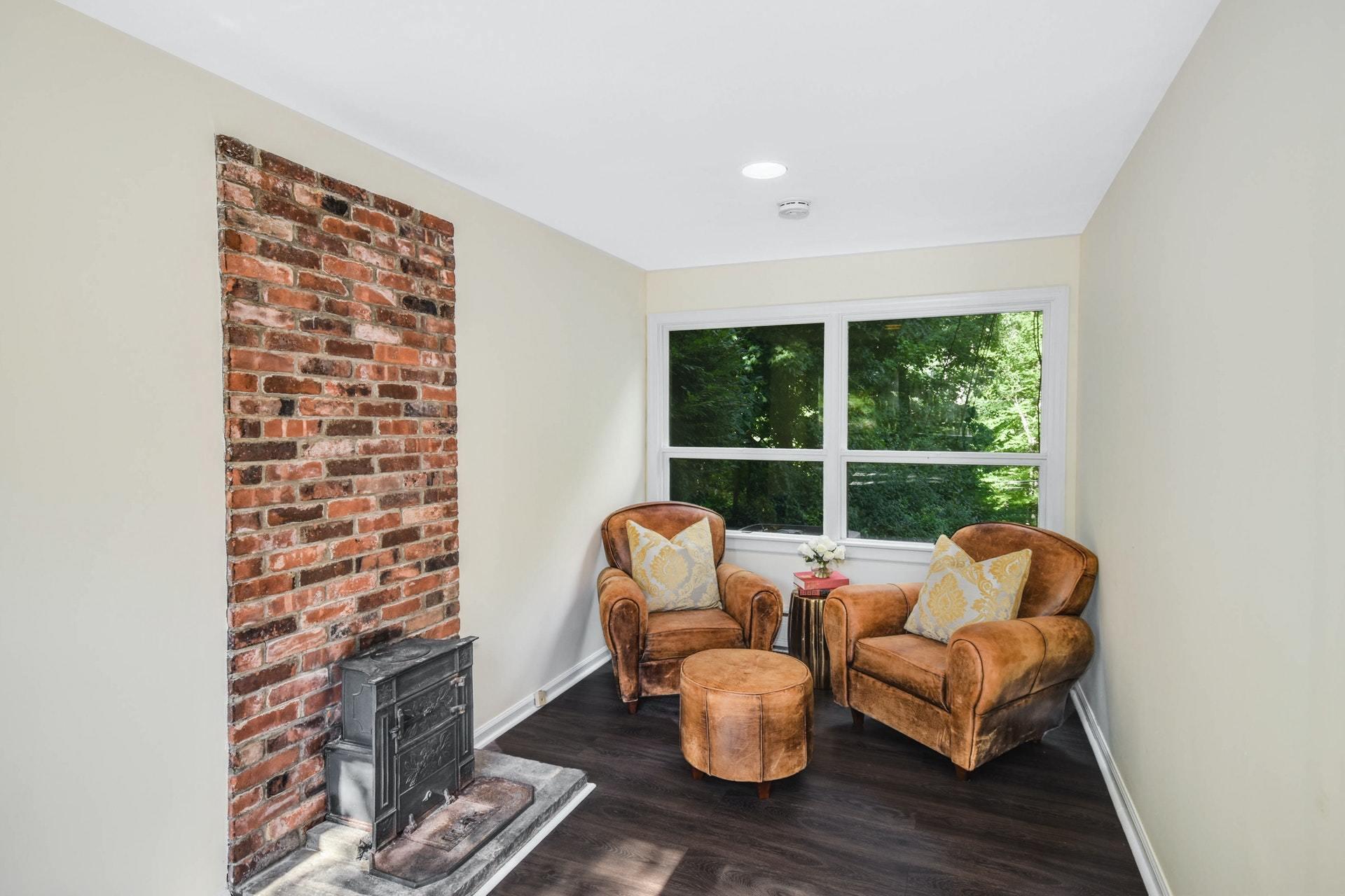 221 Mill Road New Canaan, CT 06840 - Photo 13 of 32 a living room with furniture and a window