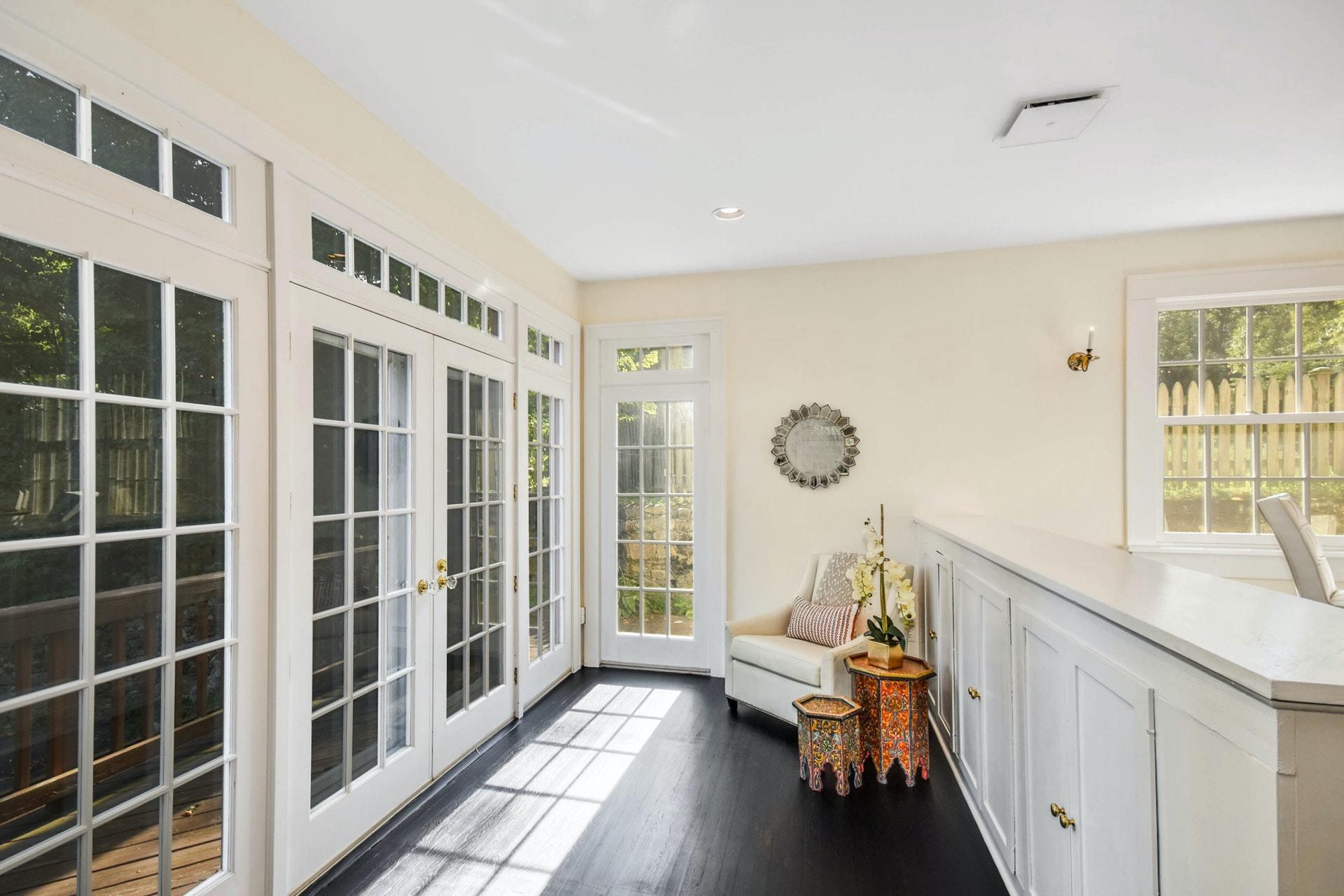 221 Mill Road New Canaan, CT 06840 - Photo 18 of 32 a living room with furniture and a window