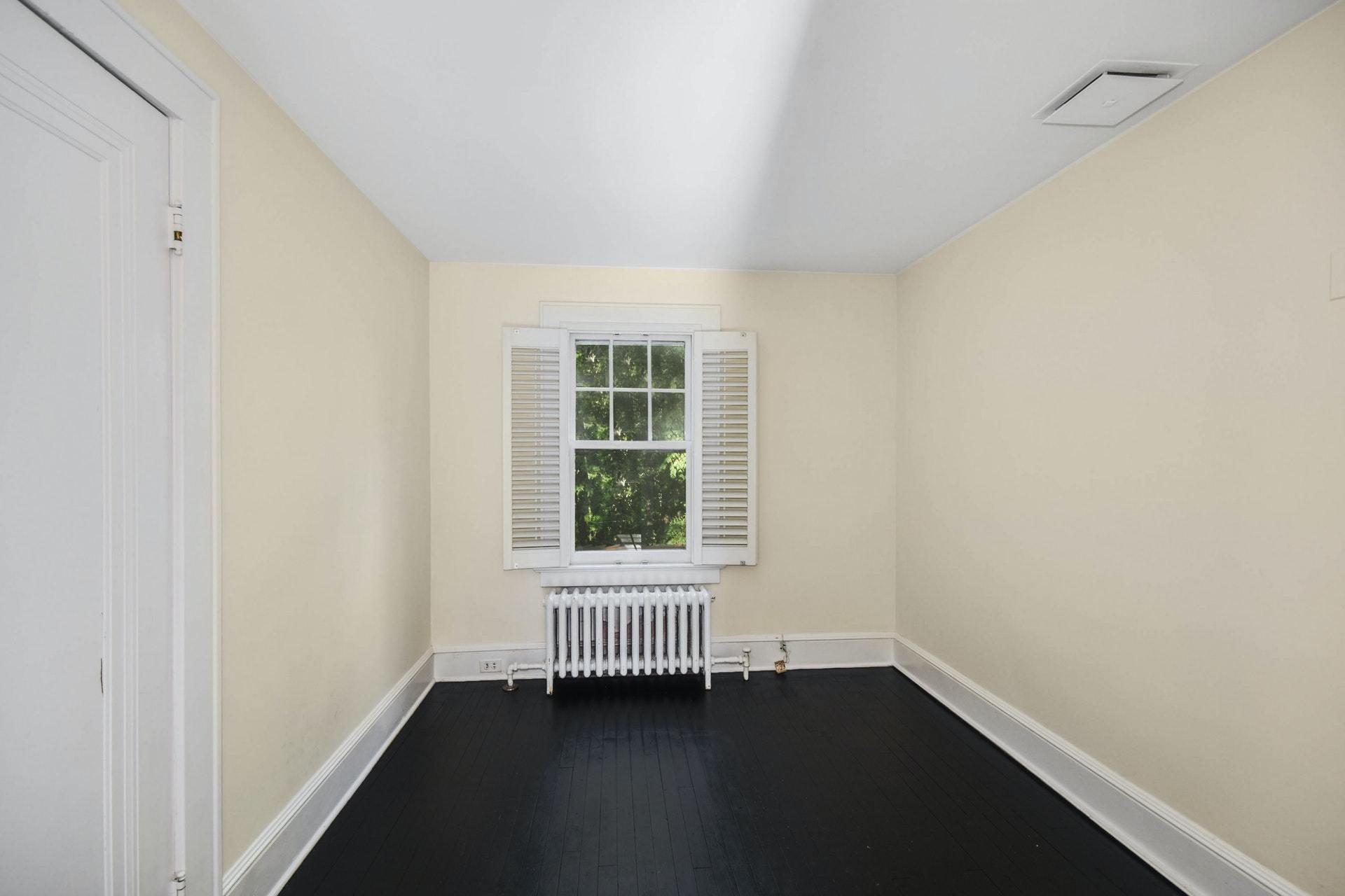 221 Mill Road New Canaan, CT 06840 - Photo 26 of 32 an empty room with a window