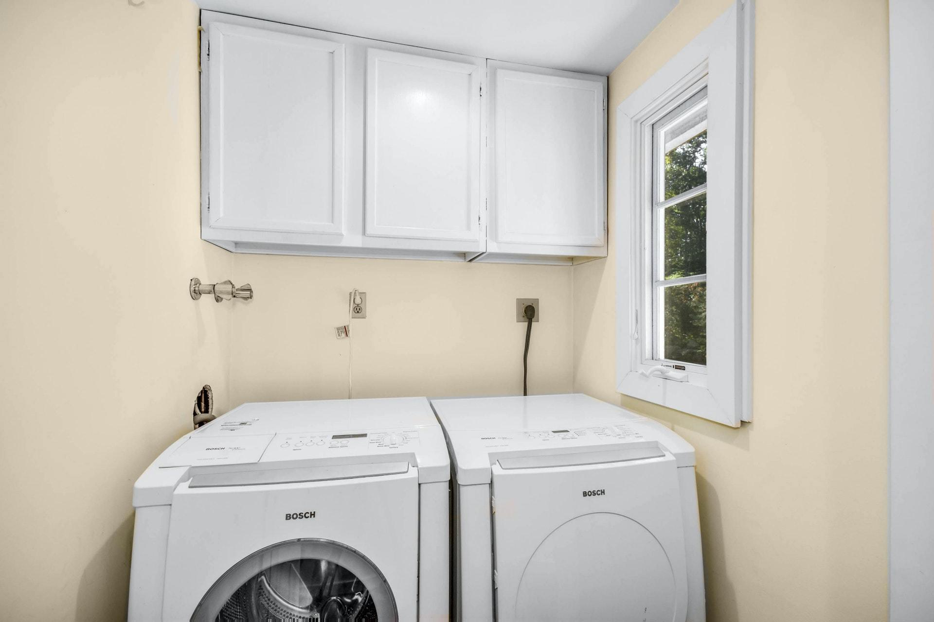 221 Mill Road New Canaan, CT 06840 - Photo 28 of 32 a utility room with dryer and washer