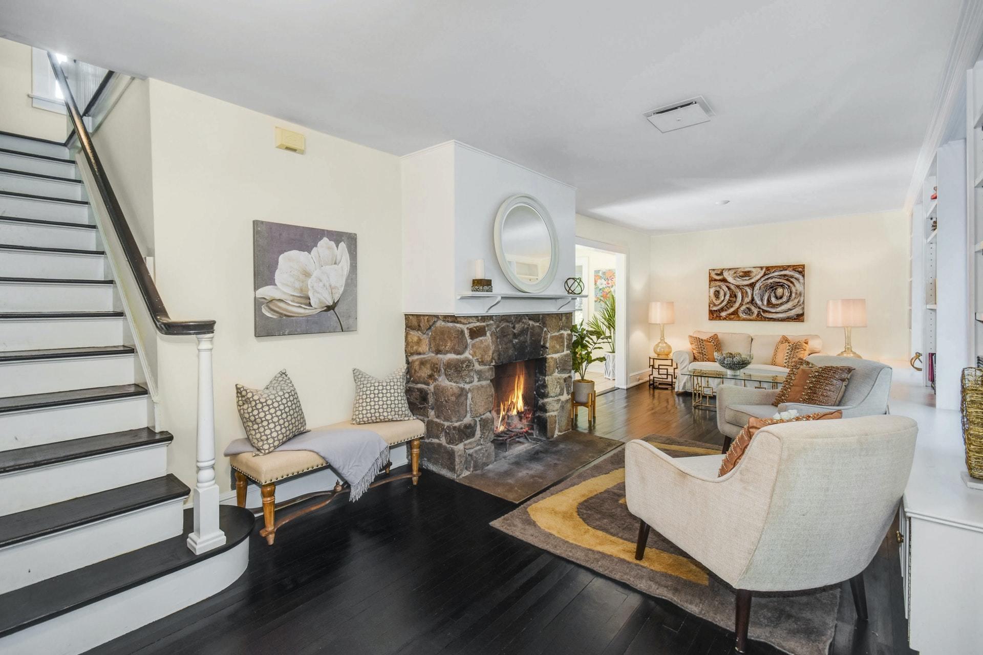 221 Mill Road New Canaan, CT 06840 - Photo 5 of 32 a living room with furniture and a fireplace