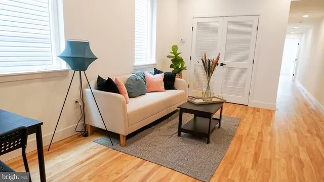a living room with furniture and a table
