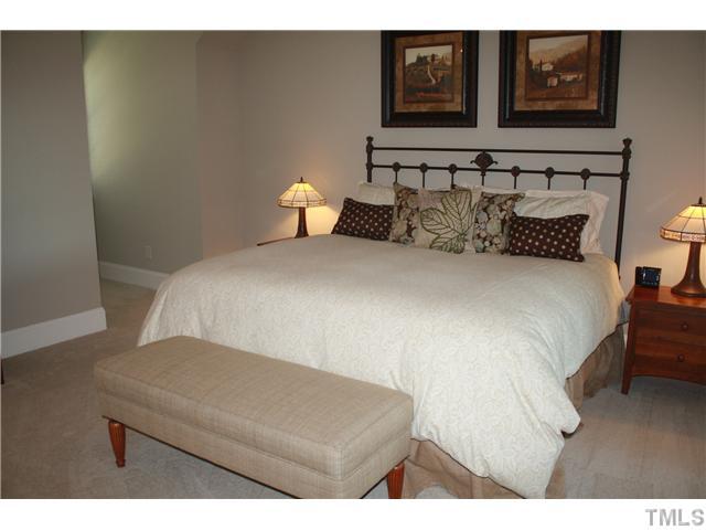 2812 Winter Song Road Raleigh, NC 27614 - Photo 15 of 24 You will rest well in this generous master bedroom which boasts crown molding, alcove storage, and a ceiling fan for comfort.