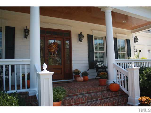2812 Winter Song Road Raleigh, NC 27614 - Photo 3 of 24 You will enjoy relaxing on this cozy, rocking chair front porch, which boasts a stained bead board ceiling with recessed lighting and brick flooring. The front entry is graced with a beautifully stained wooden front door and an old fashioned door bell.