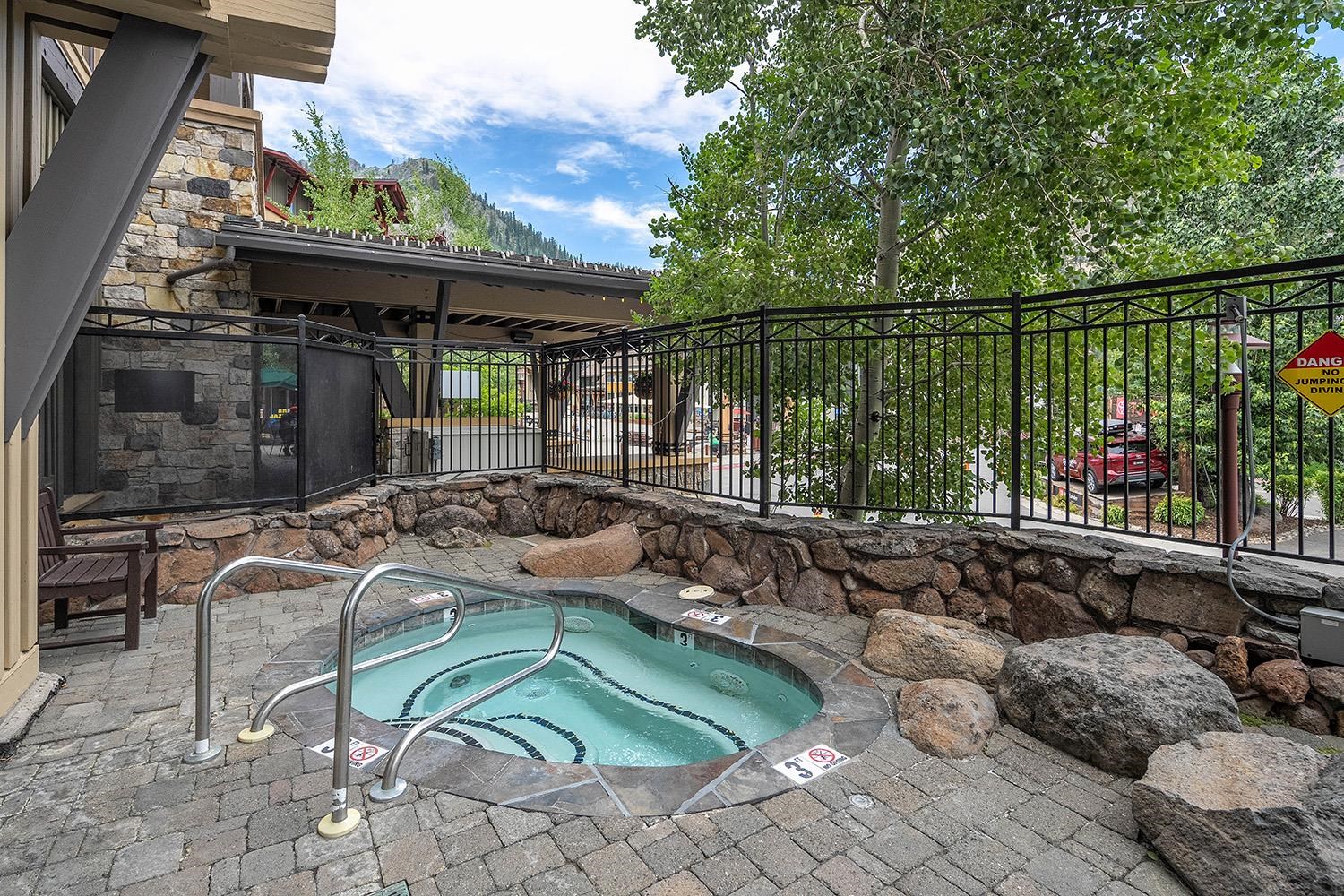 1985 Olympic Vly Road, Unit 2424 Olympic Valley, CA 96146 - Photo 18 of 21 a view of a chairs and table in backyard