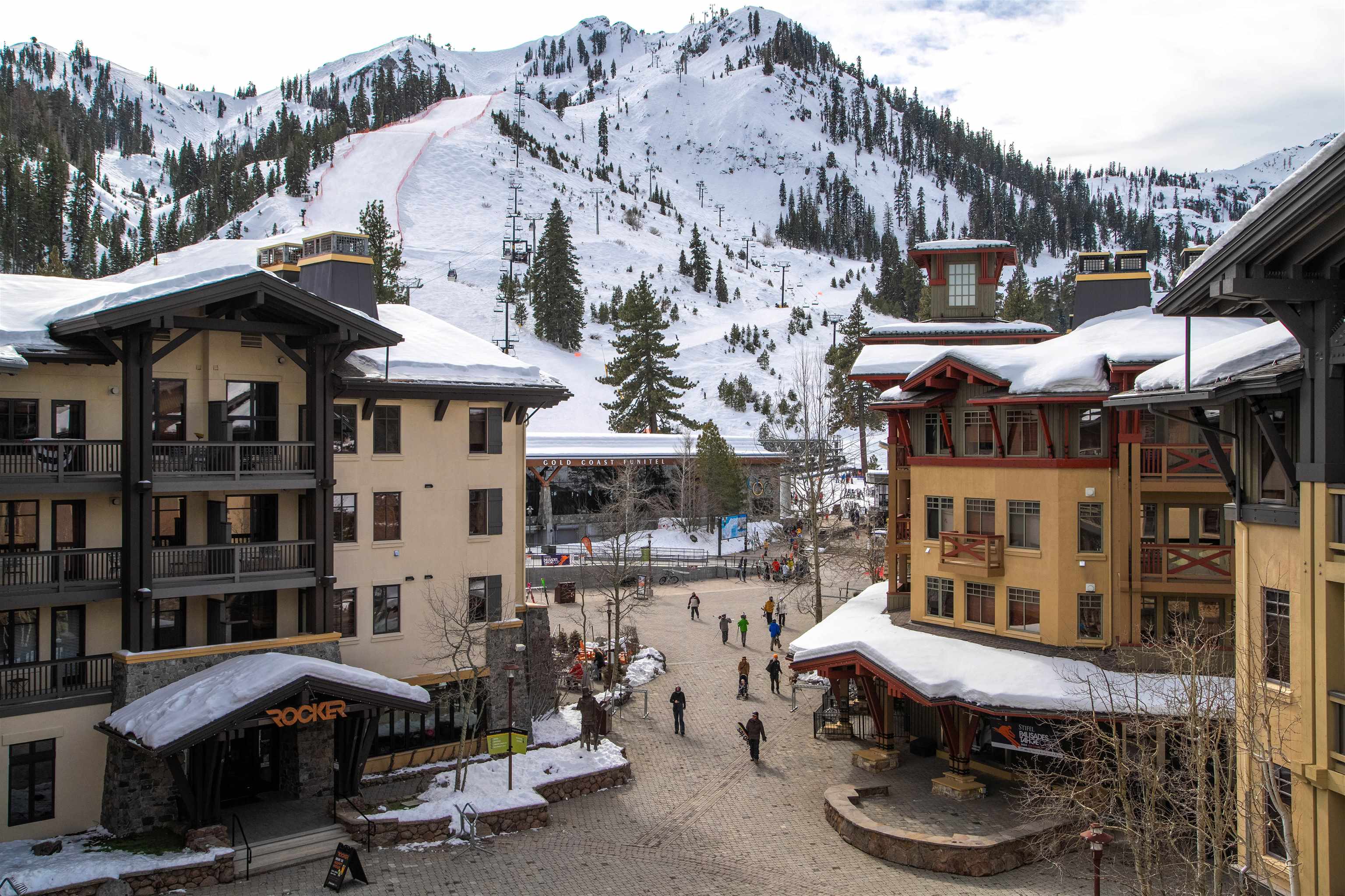 1985 Olympic Vly Road, Unit 2424 Olympic Valley, CA 96146 - Photo 2 of 21 a front view of a building with sitting area