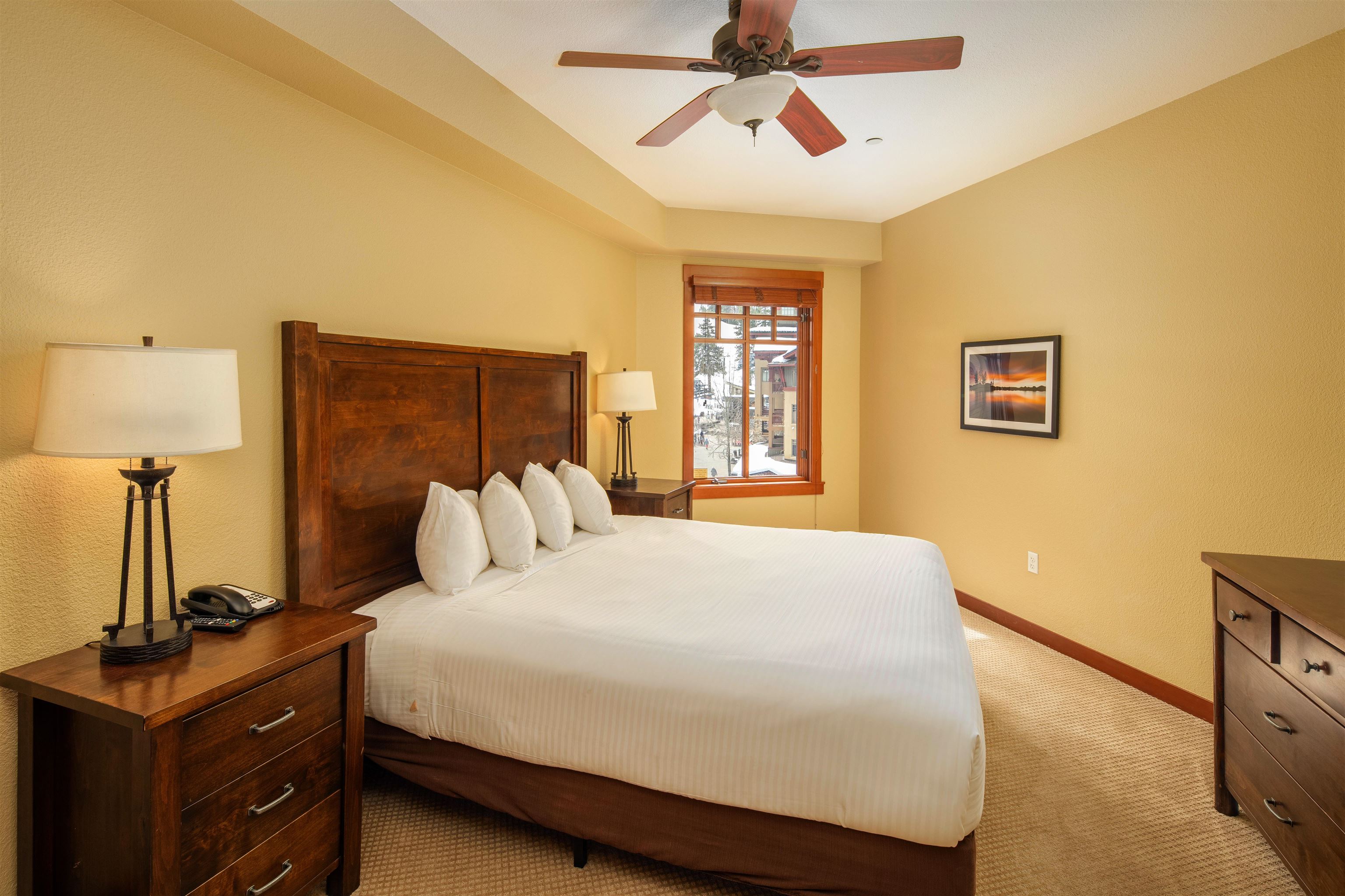 1985 Olympic Vly Road, Unit 2424 Olympic Valley, CA 96146 - Photo 9 of 21 a bedroom with a bed and wooden floor