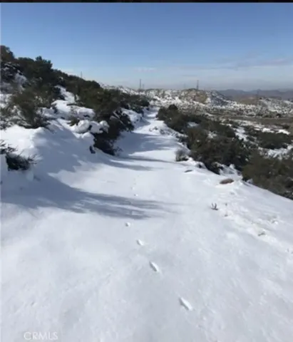 a view of a snow on the beach