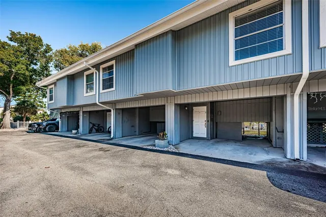 a front view of a house with yard