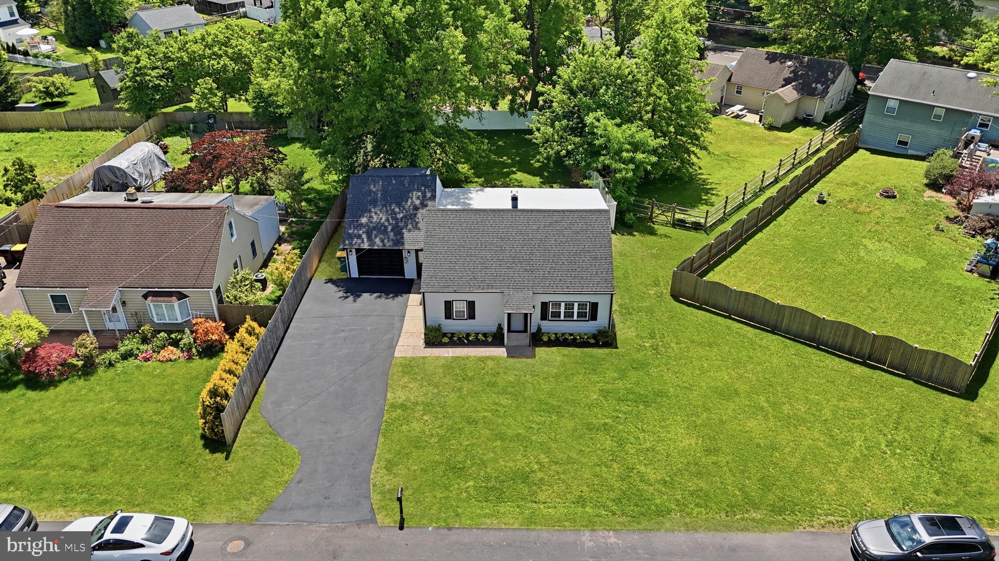 340 West Broad Street Hatfield, PA 19440 - Photo 4 of 55 an aerial view of a house with a yard basket ball court and outdoor seating
