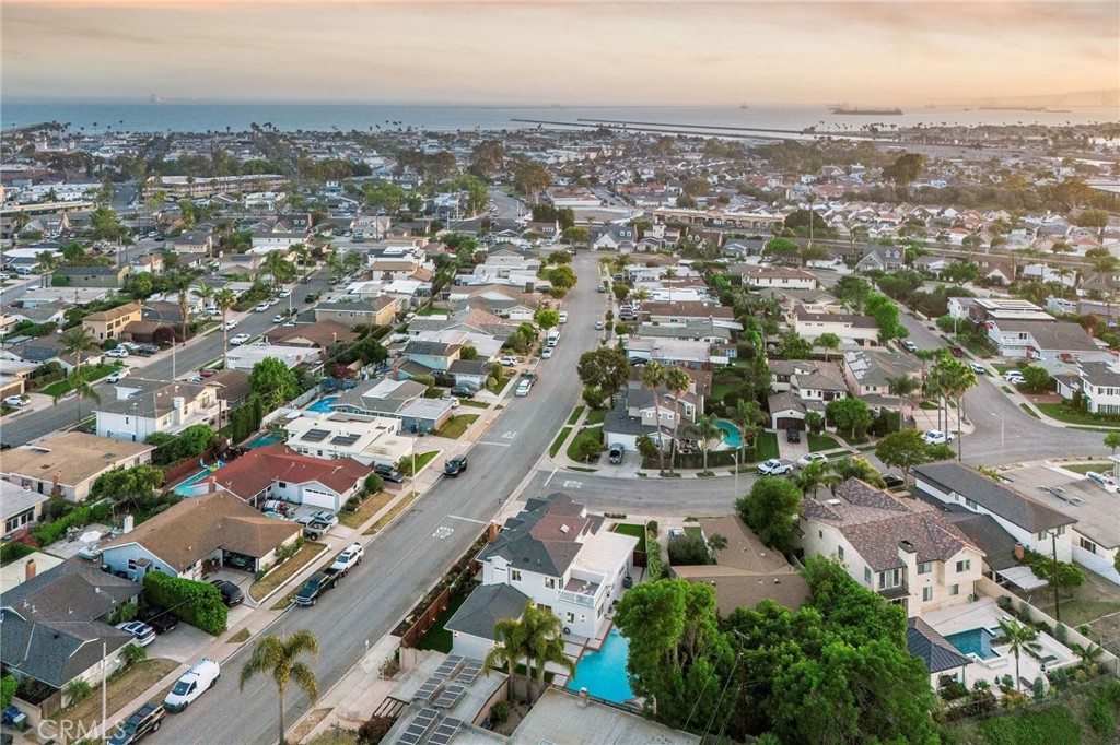 245 Surf Place Seal Beach, CA 90740 - Photo 62 of 65 an aerial view of a city with lots of residential buildings