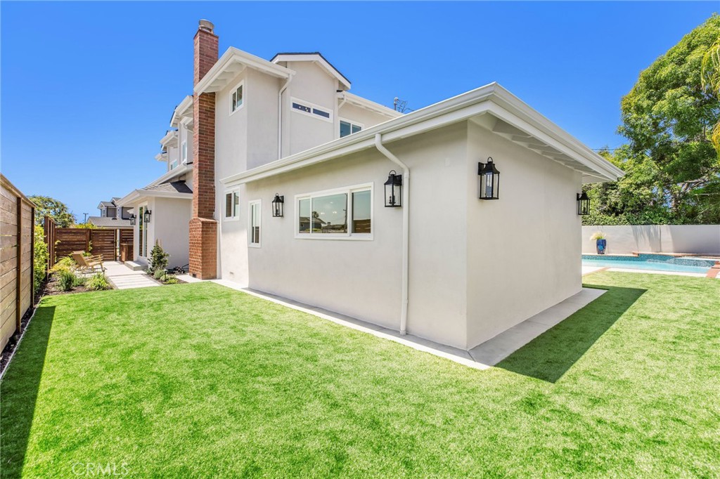 245 Surf Place Seal Beach, CA 90740 - Photo 9 of 65 a view of backyard of house