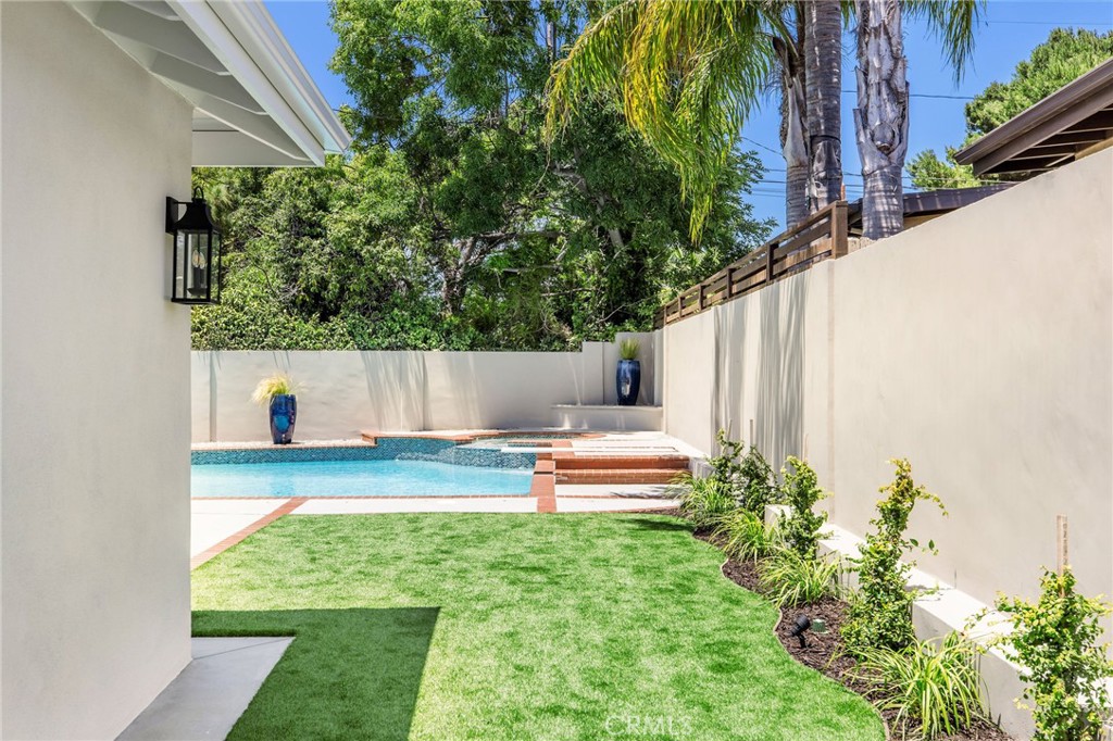 245 Surf Place Seal Beach, CA 90740 - Photo 10 of 65 a view of outdoor space and yard