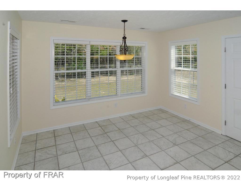 2886 Wade-Stedman Road Stedman, NC 28391 - Photo 6 of 26 a view of an empty room and window