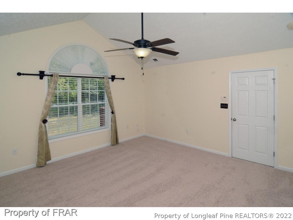 2886 Wade-Stedman Road Stedman, NC 28391 - Photo 8 of 26 a view of an empty room with a window