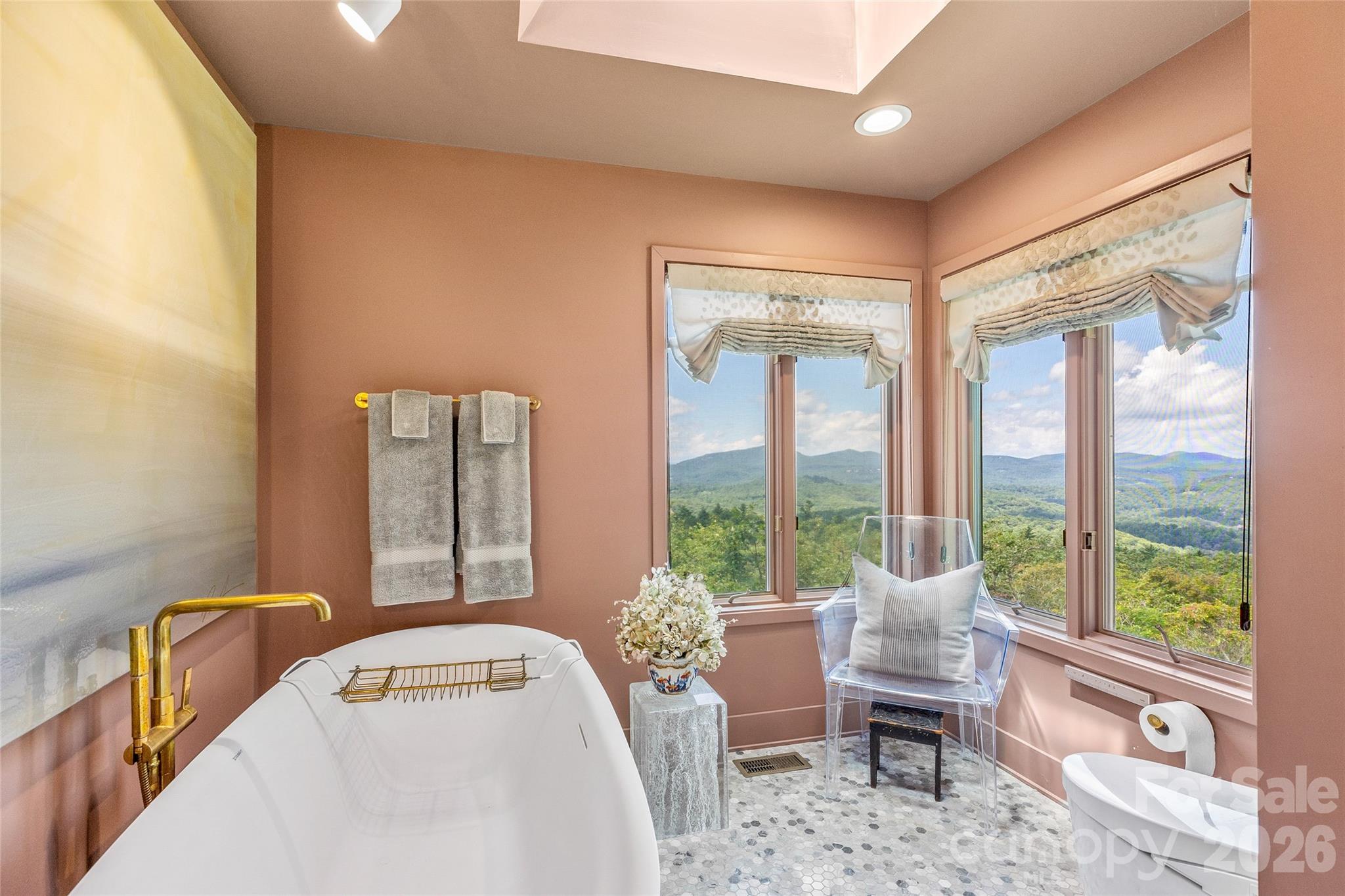 2618 Big Sheepcliff Road Cashiers, NC 28717 - Photo 18 of 35 a bedroom with furniture and a large window